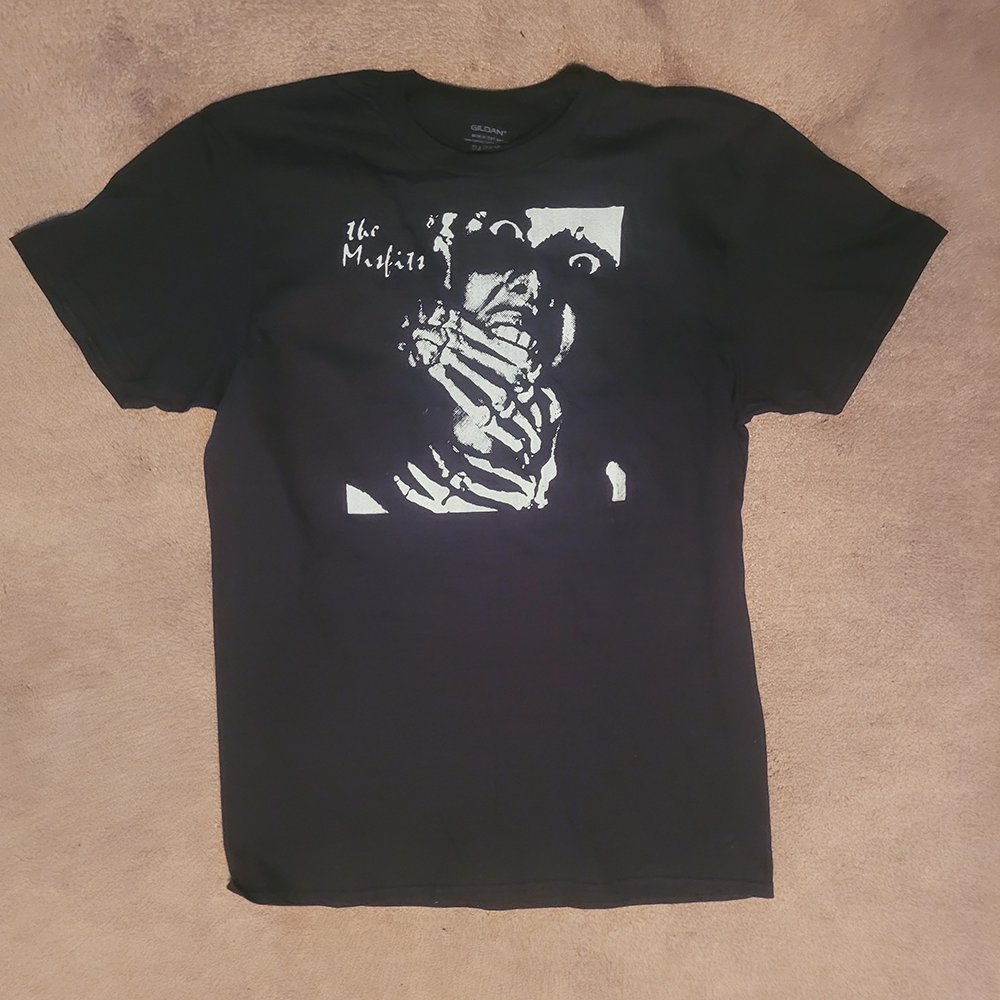 Manny Tapes Black Graphic Tee – Vintage Horror Movie Print